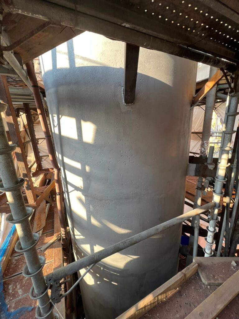 Process column after laser ablation, clean grey steel